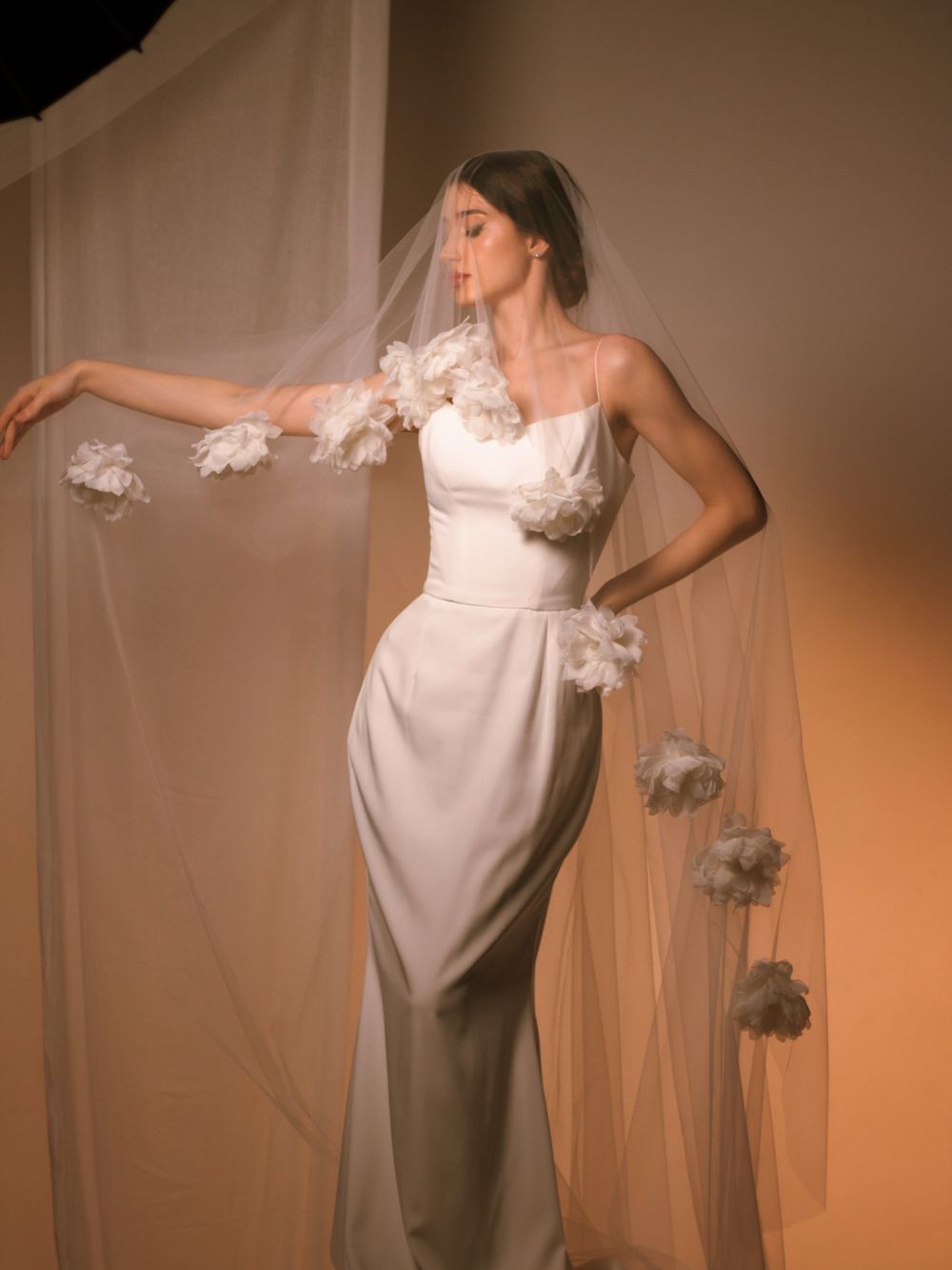 A delicate lace bridal veil detail