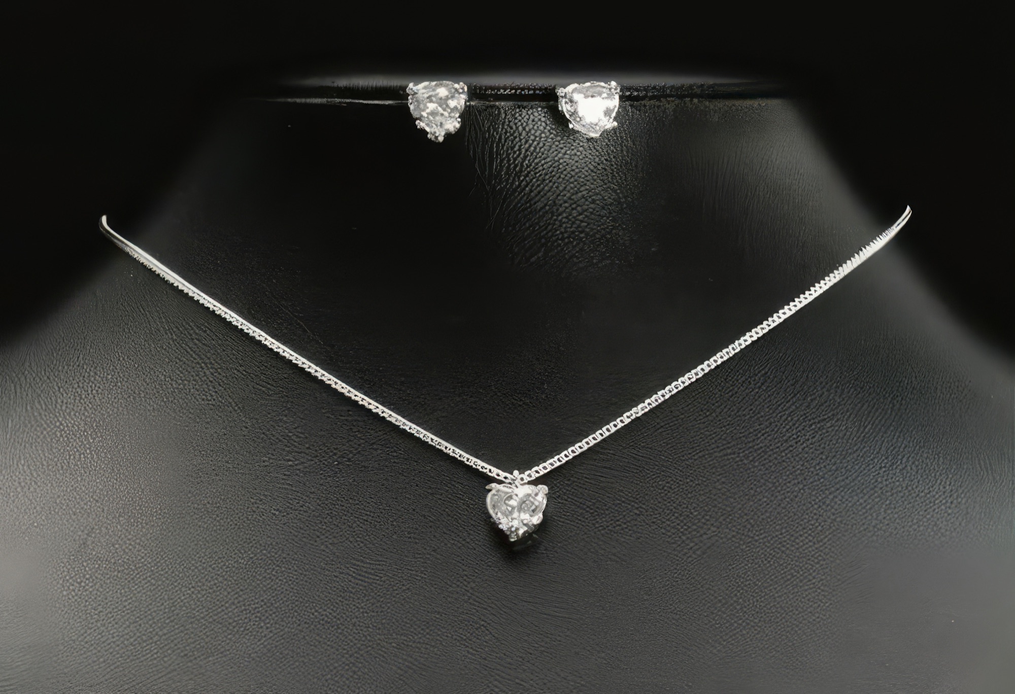 Bridal necklace with a heart pendant and matching stud earrings