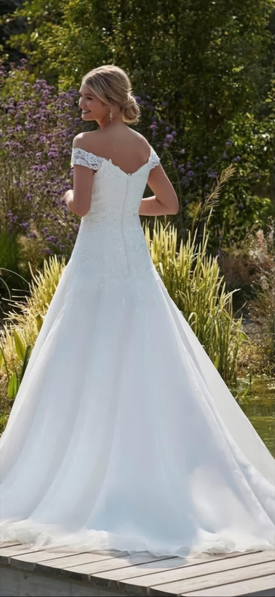 Bardot off-shoulder fit-and-flare gown — back view