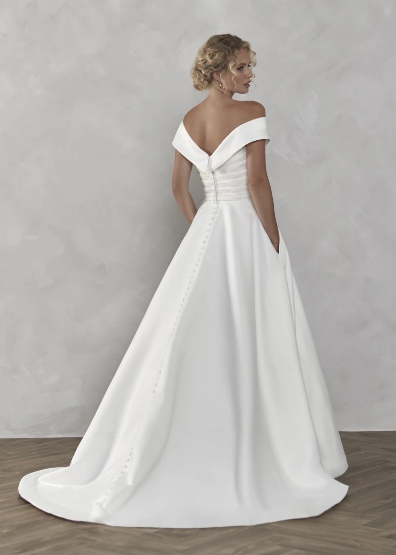 Bardot off-shoulder satin ballgown — back view