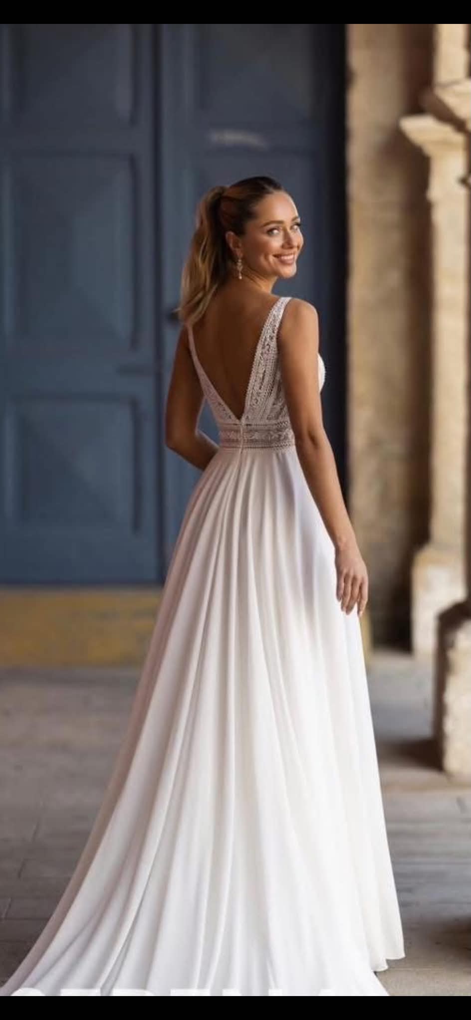 Beaded-bodice gown with a flowing chiffon skirt — back view