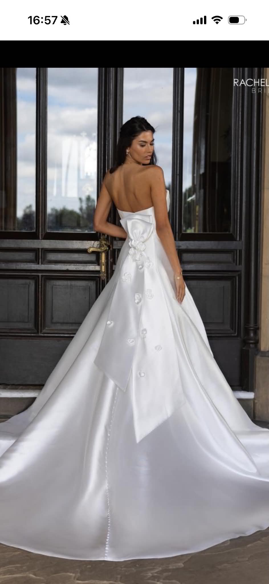 Strapless ruched fit-and-flare gown — back view