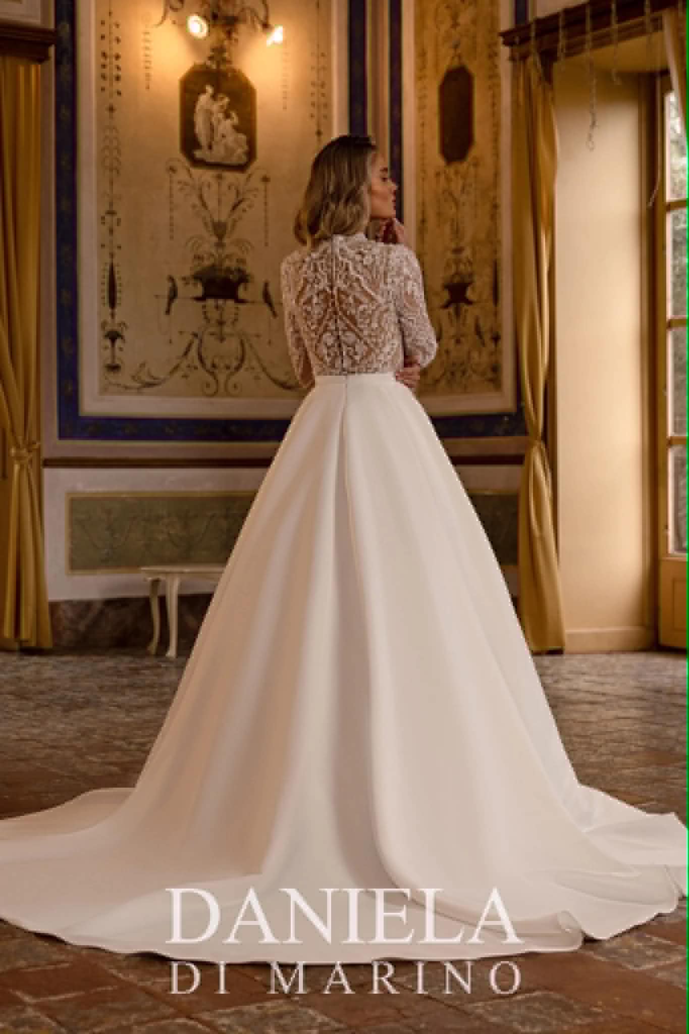 High-neck long-sleeve lace-bodice gown with a satin skirt — back view