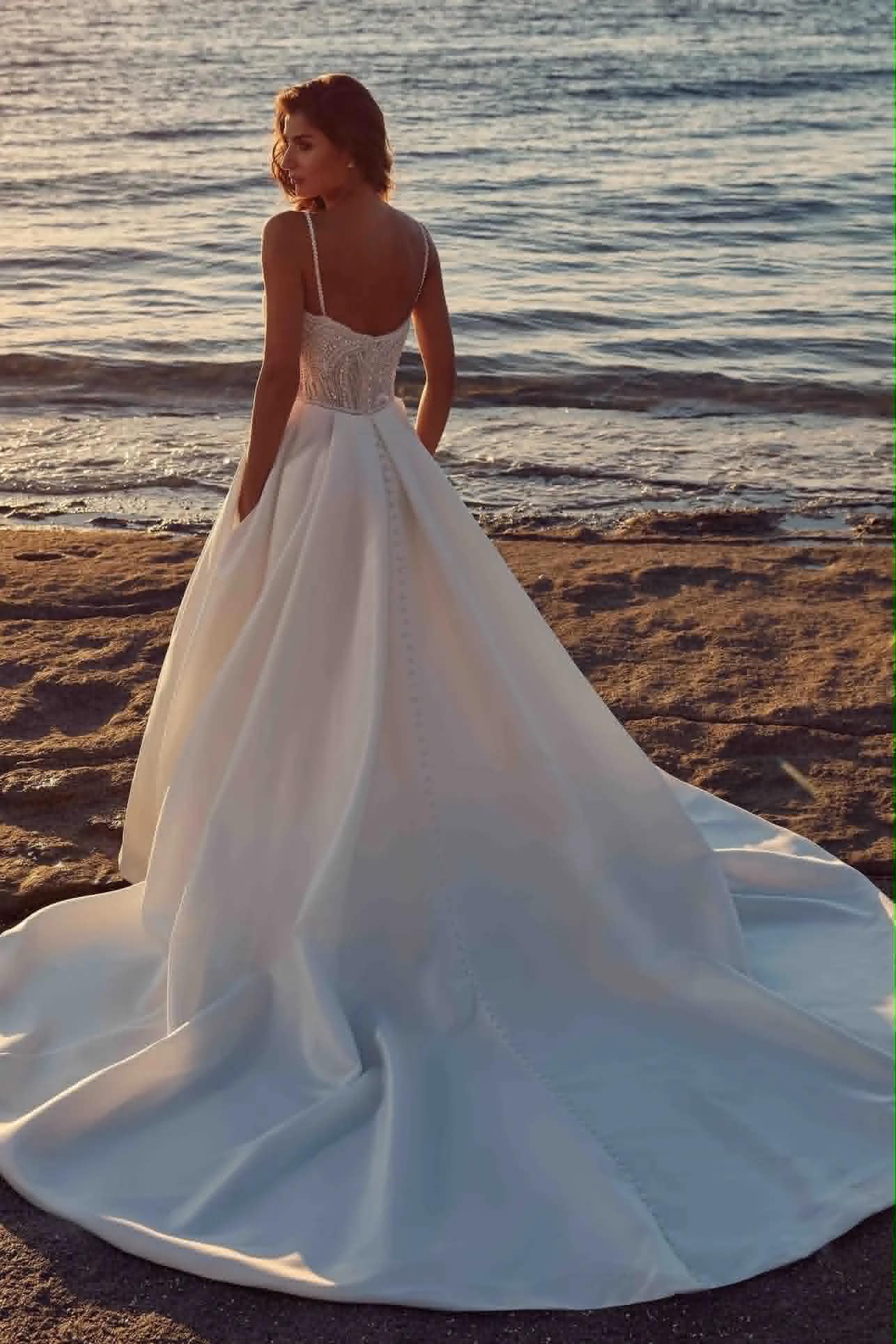Mikado A-line gown with fine straps and a front split — back view