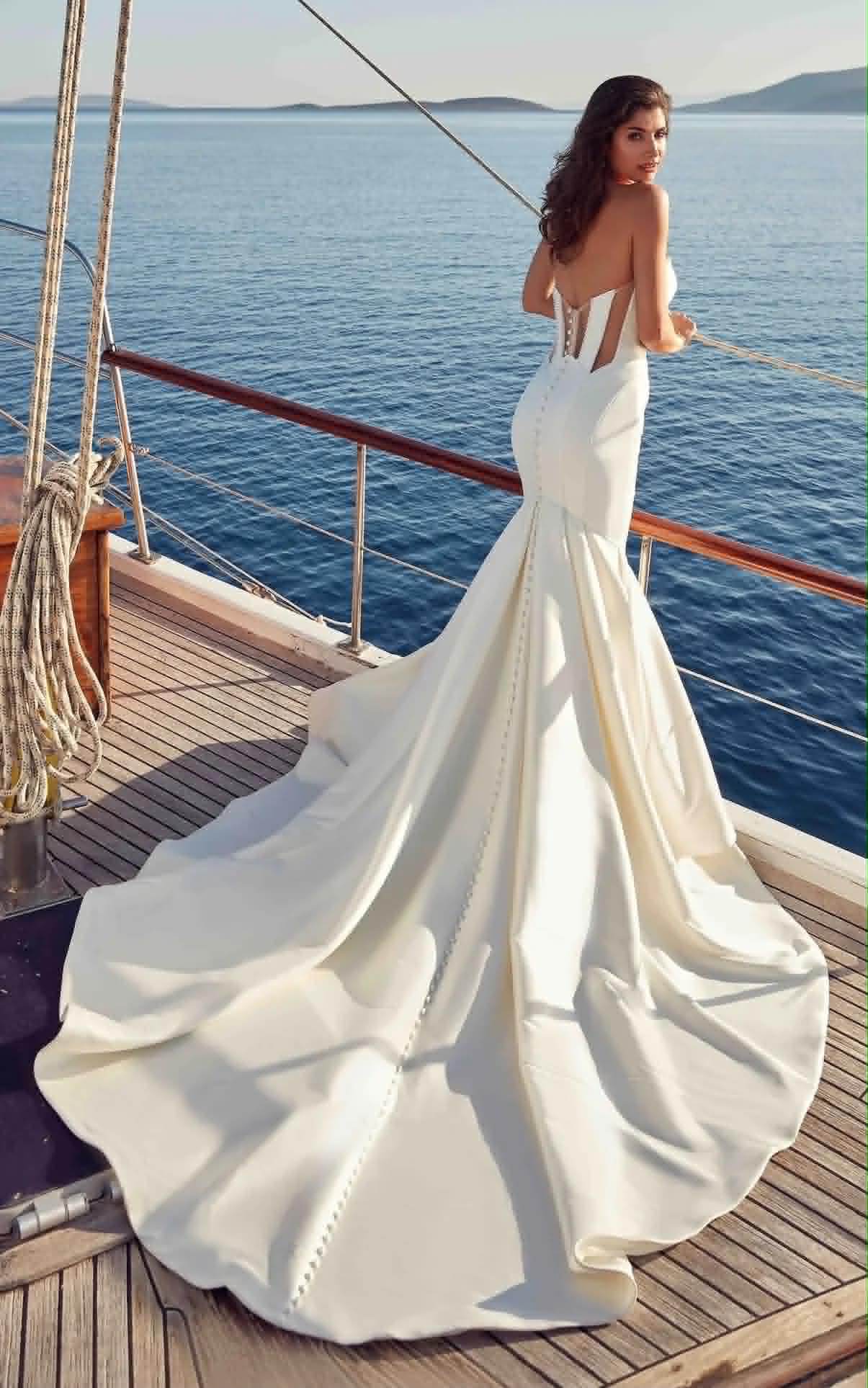 Strapless sweetheart satin fishtail gown — back view